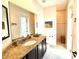 Modern bathroom with granite countertop, sleek fixtures, and a neutral color palette offers a clean, refreshing space at 3414 Sandpiper Dr, Punta Gorda, FL 33950