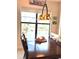 Dining area featuring a stylish light fixture, a view of the pool, and comfortable seating for Gathering gatherings at 3414 Sandpiper Dr, Punta Gorda, FL 33950