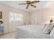 Bedroom with natural light, comfortable bedding, and ceiling fan at 4053 Joseph St, Port Charlotte, FL 33948