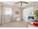 Sunlit bedroom with carpet and curtains, offering a serene and comfortable atmosphere at 4053 Joseph St, Port Charlotte, FL 33948