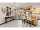 Dining area with tile floors, and adjacent kitchen at 4053 Joseph St, Port Charlotte, FL 33948