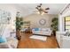 Bright living room features hardwood floors, neutral tones and comfortable seating at 4053 Joseph St, Port Charlotte, FL 33948