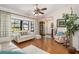 Living room with large window, wood floors and comfortable seating at 4053 Joseph St, Port Charlotte, FL 33948