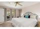 Main bedroom featuring access to an outdoor space and comfortable furnishings, blending indoor and outdoor living seamlessly at 4053 Joseph St, Port Charlotte, FL 33948