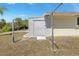 An outdoor shed sits to the rear of the home, with easy access and a simple design at 4053 Joseph St, Port Charlotte, FL 33948