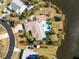 Waterfront property with a large lot, mature trees and pool; house is situated in a charming, quiet neighborhood at 4438 Meager Cir, Port Charlotte, FL 33948