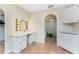 Bathroom featuring vanity with makeup lighting, and terra cotta tile flooring at 4438 Meager Cir, Port Charlotte, FL 33948