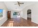 Bedroom with views to the pool featuring tile floors, a ceiling fan and walk-in closet at 4438 Meager Cir, Port Charlotte, FL 33948