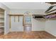 Spacious closet with built-in shelving and clothing racks, connecting to another room with a window at 4438 Meager Cir, Port Charlotte, FL 33948