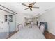 Well-lit dining area with sliding door access to the outside and views of adjacent rooms at 4438 Meager Cir, Port Charlotte, FL 33948
