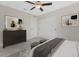 Well-lit bedroom features tile flooring, ceiling fan, and ample closet space at 5097 Wagon Wheel Dr, North Port, FL 34291