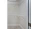 Walk-in closet with shelving for organizing clothes and storage items at 5097 Wagon Wheel Dr, North Port, FL 34291