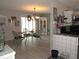 Bright dining room with a stylish table set, offering a cozy space for meals and entertaining at 523 Oliphant Ln, Punta Gorda, FL 33950