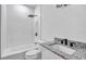 Modern bathroom features a shower, a bathtub and granite countertops at 551 Crandall Nw St, Port Charlotte, FL 33952