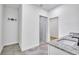 Modern bathroom featuring double vanity, glass shower, and gray tile flooring at 551 Crandall Nw St, Port Charlotte, FL 33952