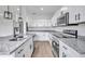 Modern kitchen with granite counters, stainless appliances and a functional layout, perfect for cooking and entertaining at 551 Crandall Nw St, Port Charlotte, FL 33952