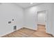 Spacious laundry room with wood-look floors, and hook ups at 551 Crandall Nw St, Port Charlotte, FL 33952