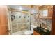Tastefully designed bathroom with decorative tile accents, a glass shower enclosure, and an elegant vessel sink at 5705 44Th E Ave, Bradenton, FL 34203