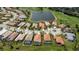 Gorgeous aerial view showcasing the community homes, beautiful lake and lush golf course at 5733 White Jasmine Way, North Port, FL 34287