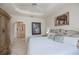 Bright main bedroom with en-suite bathroom access at 5733 White Jasmine Way, North Port, FL 34287