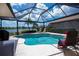 This screened-in pool is perfect for relaxation and entertaining, and has great views at 5733 White Jasmine Way, North Port, FL 34287