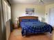 Comfortable bedroom with a decorative bed, side tables, and ample natural light at 6327 Fabian Rd, North Port, FL 34287