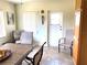 Bright dining room featuring tile flooring, table with chairs, and lots of natural light at 6327 Fabian Rd, North Port, FL 34287