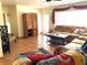 Comfortable seating arrangement in the living room, featuring tile flooring and ample natural light at 6327 Fabian Rd, North Port, FL 34287