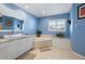 Stylish bathroom features a soaking tub and vanity with granite countertops at 1091 Rotonda Cir, Rotonda West, FL 33947