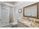 Bright bathroom featuring a shower and tub, granite countertop, and modern fixtures at 1091 Rotonda Cir, Rotonda West, FL 33947