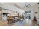 Inviting open-concept living room with hardwood floors and sliding doors to outdoor space at 1091 Rotonda Cir, Rotonda West, FL 33947