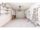 Epoxy-floored garage with shelving, providing a clean and organized space for storage and projects at 1357 Nimrod St, Port Charlotte, FL 33952