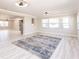 Open-concept living room providing ample space for relaxation and entertaining with an eat-in kitchen at 1357 Nimrod St, Port Charlotte, FL 33952