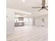 Bright, open-concept living space with neutral tones and recessed lighting at 1357 Nimrod St, Port Charlotte, FL 33952