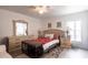 Cozy bedroom with ceiling fan features a bright window for plenty of natural light at 1721 Nicollett Ave, North Port, FL 34286