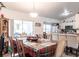 Open dining area features great flow to the living area and kitchen at 1721 Nicollett Ave, North Port, FL 34286