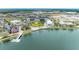 Aerial view showcasing new construction with community amenities, lush landscapes and walkable streets at 17420 Jadestone Ct, Venice, FL 34293