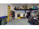 Organized garage with storage racks and epoxy flooring at 17420 Jadestone Ct, Venice, FL 34293