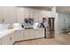Modern kitchen featuring white cabinets, stainless steel appliances, and an induction cooktop at 17420 Jadestone Ct, Venice, FL 34293