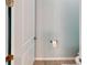 Powder room with tile floor, and wood door frame at 17420 Jadestone Ct, Venice, FL 34293