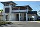 The community pro shop featuring a modern exterior and convenient golf cart parking at 17420 Jadestone Ct, Venice, FL 34293