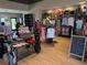 Interior of community's well-stocked Pro Shop with displays of golf apparel and accessories at 17420 Jadestone Ct, Venice, FL 34293