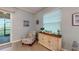 Comfortable seating area with stylish furniture and a view of the outdoors at 17420 Jadestone Ct, Venice, FL 34293