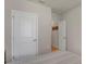Shot of an empty bedroom looking toward the closet and door at 1796 W Palms Dr, Port Charlotte, FL 33953