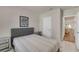 This is a carpeted bedroom with a view to the dining area at 1796 W Palms Dr, Port Charlotte, FL 33953
