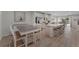 Bright and airy kitchen with stainless appliances, a kitchen island with seating, and dining area at 1796 W Palms Dr, Port Charlotte, FL 33953