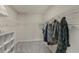 Walk-in closet with wire shelving, offering ample storage space for clothes and accessories at 1796 W Palms Dr, Port Charlotte, FL 33953