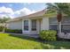 Close up view of single-story home's exterior at 1940 Scarlett Ave, North Port, FL 34289
