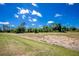 Expansive backyard with lush greenery, perfect for outdoor entertaining at 2241 Boxwood St, North Port, FL 34289