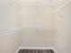 An empty closet with coated wire shelving and wood-look flooring at 2241 Boxwood St, North Port, FL 34289